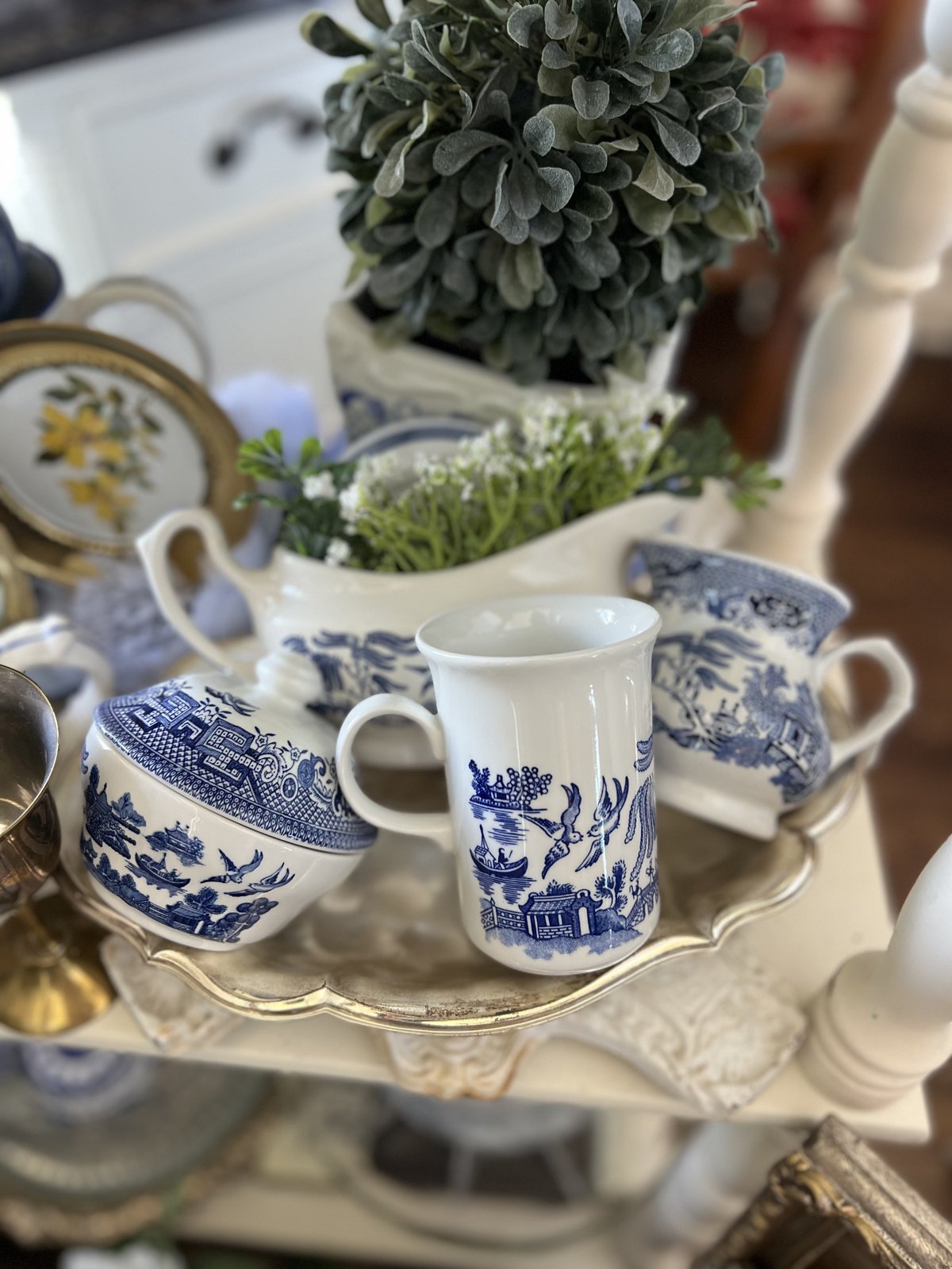 Blue Willow pattern sugar bowl, mug, and creamer